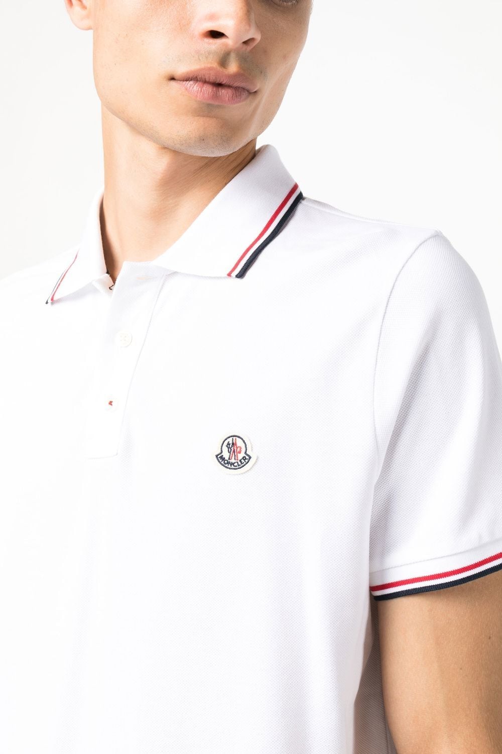 logo patch short sleeve polo shirt by moncler - bottegalusso: premier destination for modern luxury menswear