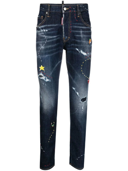 illustrated distressed skinny jeans