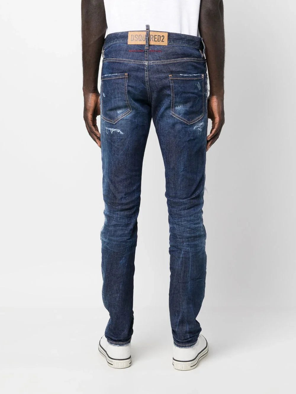 distressed-finish denim jeans