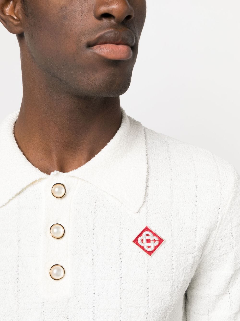 logo embroidered bouclé polo shirt by casablanca - bottegalusso: premier destination for modern luxury menswear