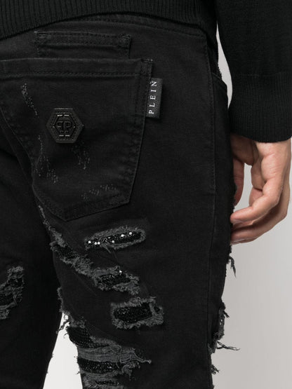 Distressed slim-fit jeans