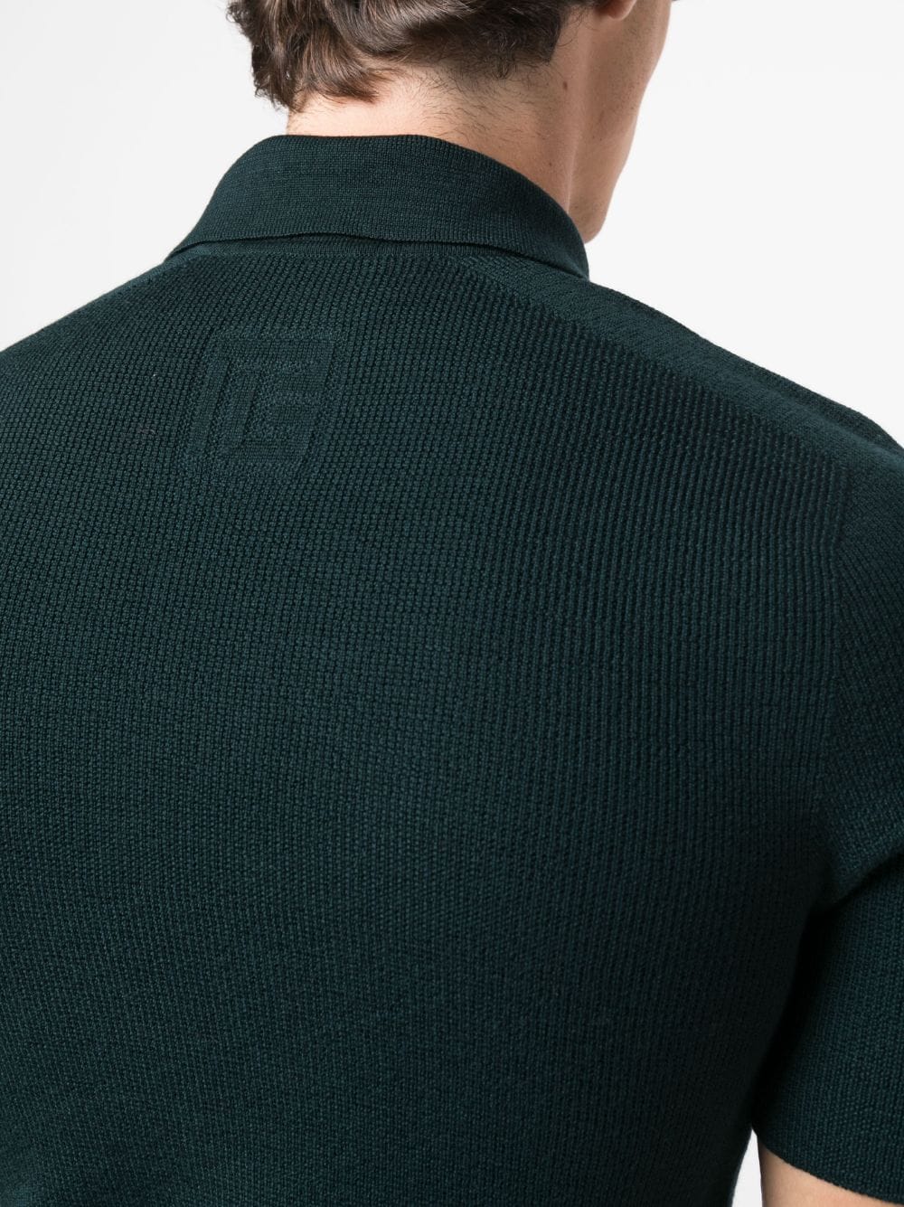 logo patch wool polo shirt by balmain - bottegalusso: premier destination for modern luxury menswear