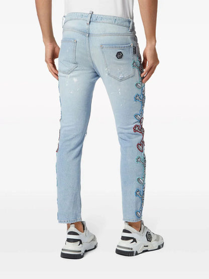 Skully Gang low-rise skinny jeans