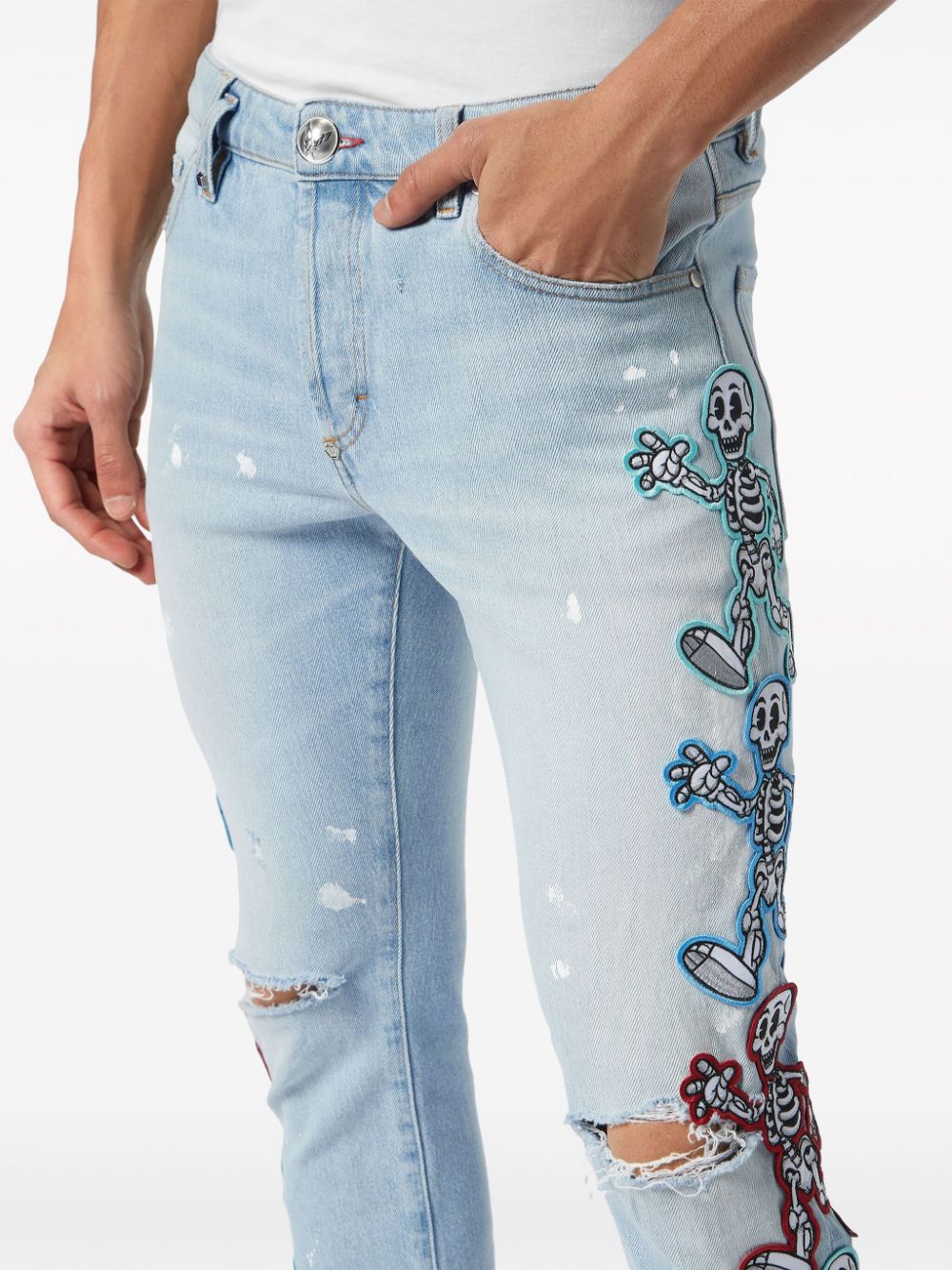 skully gang low-rise skinny jeans